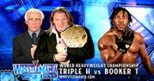 Induction: Booker T vs. Triple H – HHH goes KKK